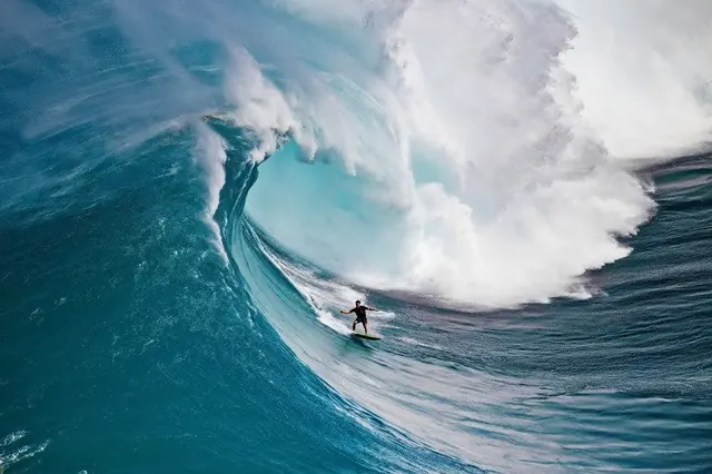 Making the drop · Big wave